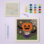 Pumpkin Hot Air Balloon canvas before and after punching, with the threads and tools