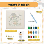 What is in the Pumpkin Hug Ghost kit: printed canvas, punch needle, threader, threads, color guide and hangers