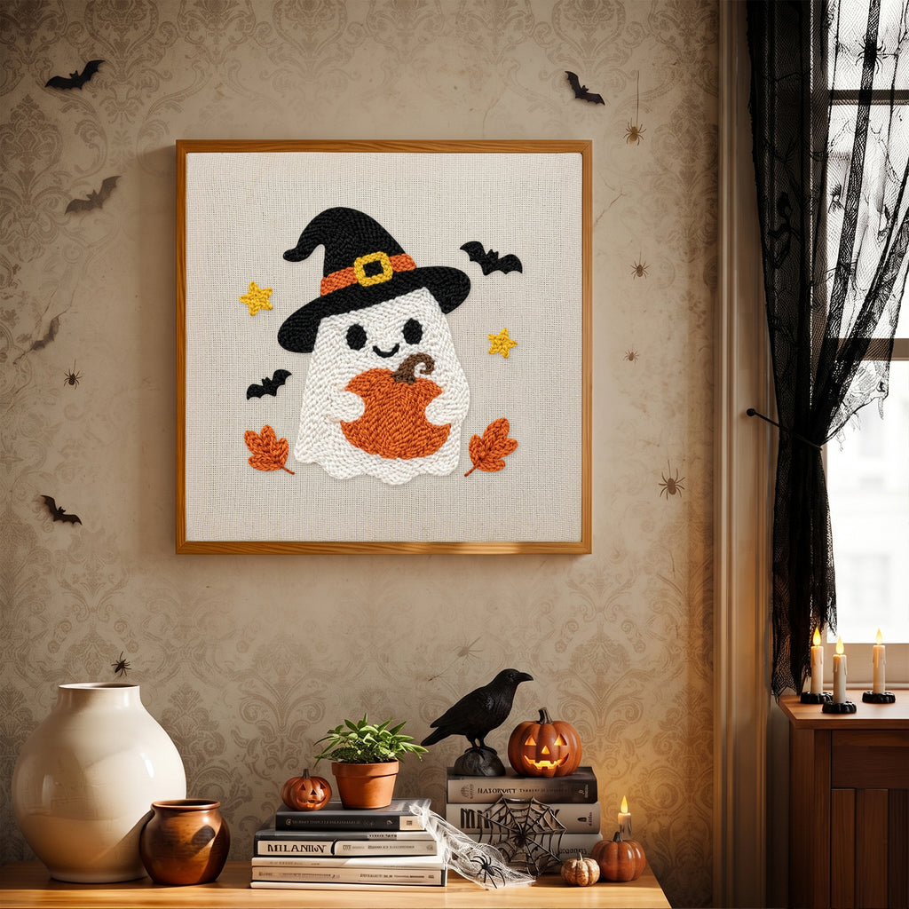 Finished Pumpkin Hug Ghost punch needle canvas on a wall