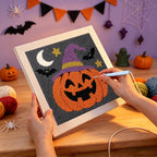 Punching the Pumpkin in a Purple Hat design with the punch needle