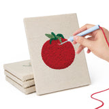 Hand punching one of the Pumpkin Pepper Patch mini canvases