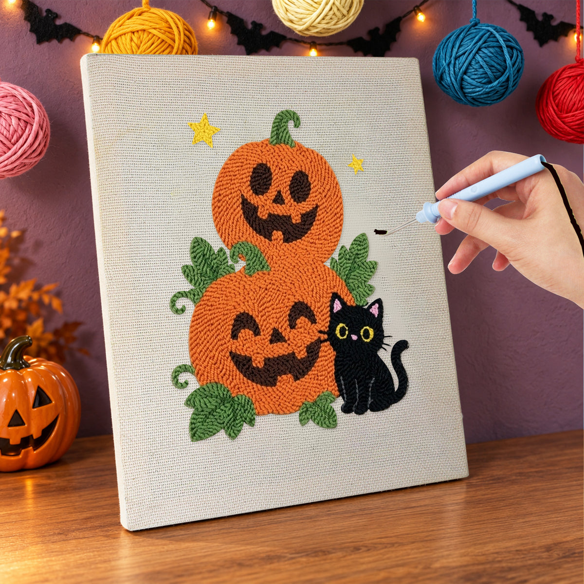 Punching the Pumpkin Stack and Cat design with the punch needle