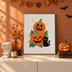 Finished Pumpkin Stack and Cat punch needle canvas on a wall