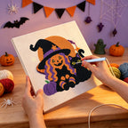 Punching the Pumpkin Witch and Cat design with the punch needle
