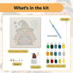 What is in the Pumpkin Witch Brew kit: printed canvas, punch needle, threader, threads, color guide and hangers