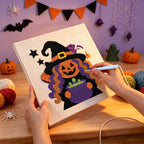 Punching the Pumpkin Witch Brew design with the punch needle