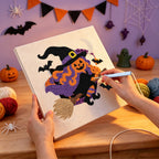 Punching the Pumpkin Witch in Flight design with the punch needle
