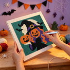 Punching the Pumpkin Witch Twins design with the punch needle
