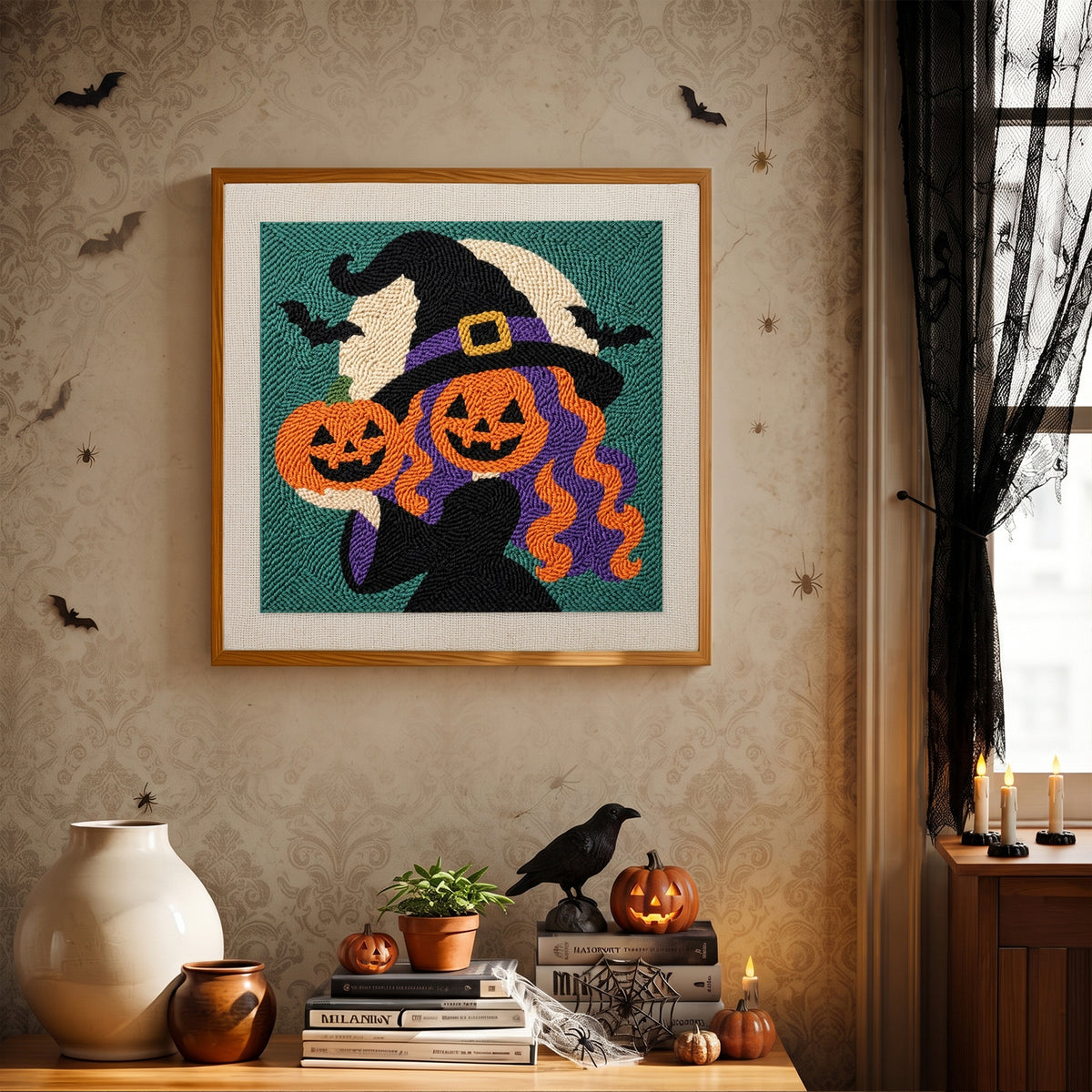 Finished Pumpkin Witch Twins punch needle canvas on a wall