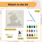 What is in the Pumpkins in a Witch Boot kit: printed canvas, punch needle, threader, threads, color guide and hangers