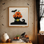 Finished Pumpkins in a Witch Boot punch needle canvas on a wall