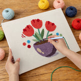 Punching the Purple Bowl Tulips design with the punch needle