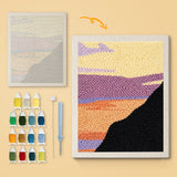 Purple Cliff Sunset canvas before and after punching, with the threads and tools