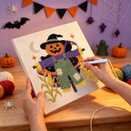 Punching the Purple Coat Scarecrow design with the punch needle