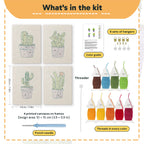 What is in the Purple Pot Cacti set: 4 printed canvases, punch needle, threader, threads, color guide and 4 sets of hangers (6 × 8 in (15 × 20 cm) each)