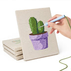 Hand punching one of the Purple Pot Cacti mini canvases