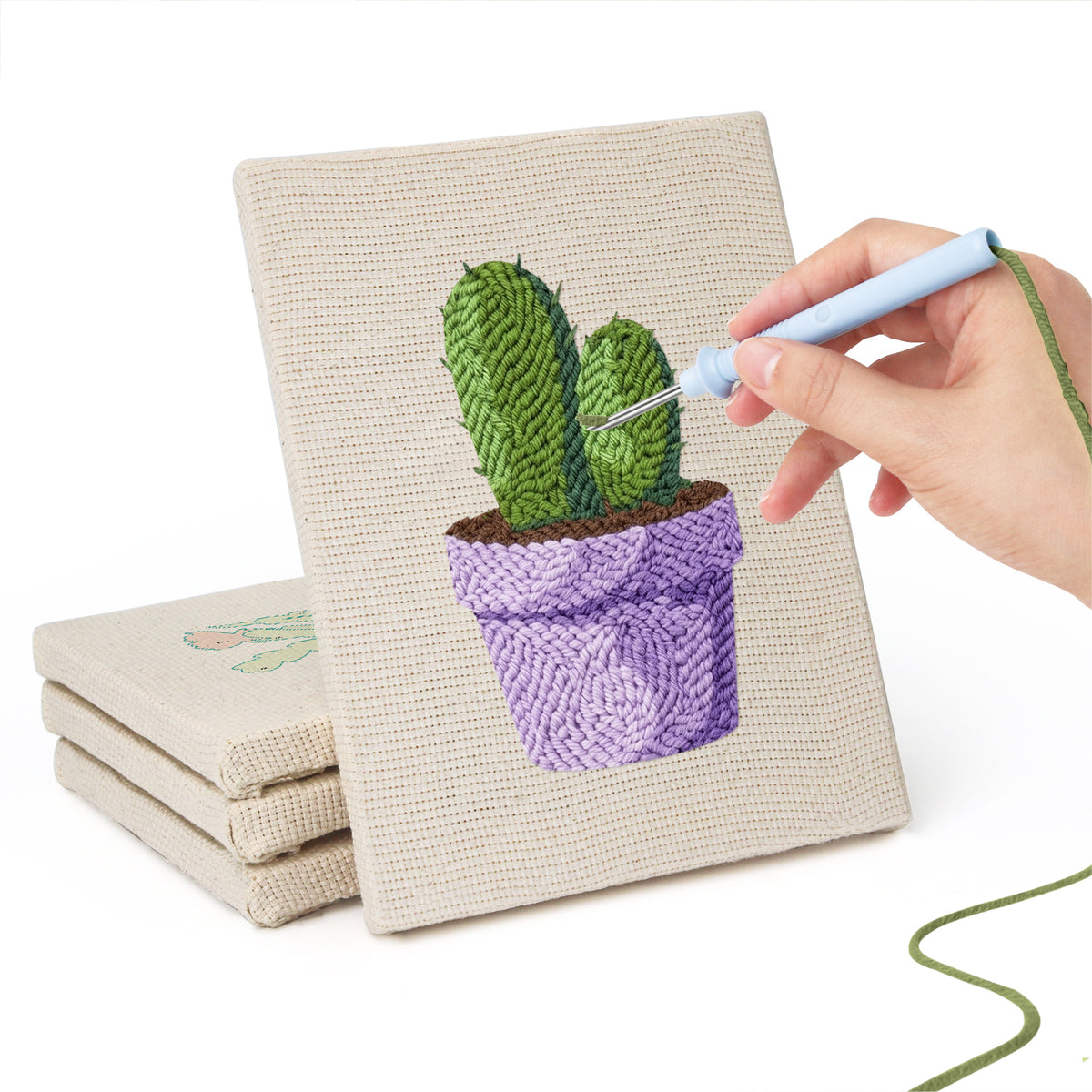Hand punching one of the Purple Pot Cacti mini canvases