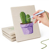 Hand punching one of the Purple Pot Cacti mini canvases