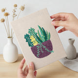 Hand holding a finished Purple Pot Plants mini canvas