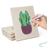 Hand punching one of the Purple Pot Plants mini canvases