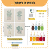 What is in the Purple Pot Plants set, 8 × 12 in (20 × 30 cm) each: 4 printed canvases, punch needle, threader, threads, color guide and 4 sets of hangers