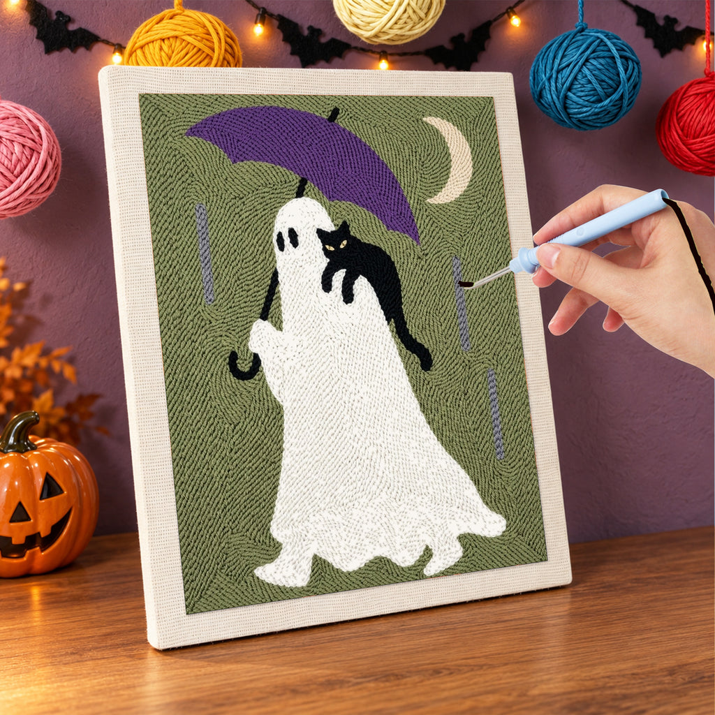 Punching the Purple Umbrella Ghost design with the punch needle