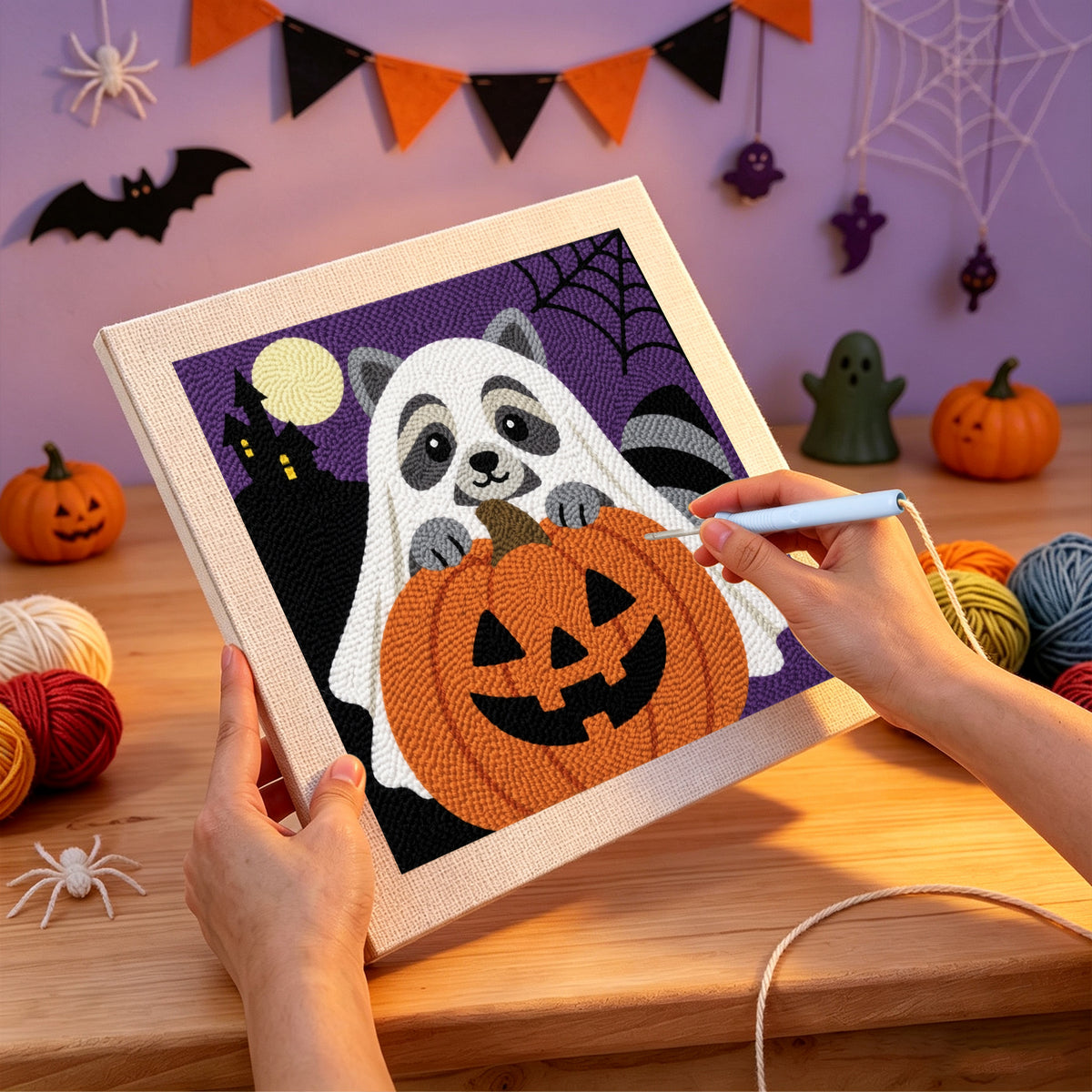 Punching the Raccoon Ghost design with the punch needle