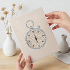 Hand holding a finished Race Day Gear mini canvas