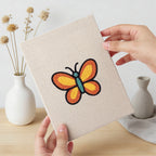 Hand holding a finished Rainbow and Butterfly mini canvas