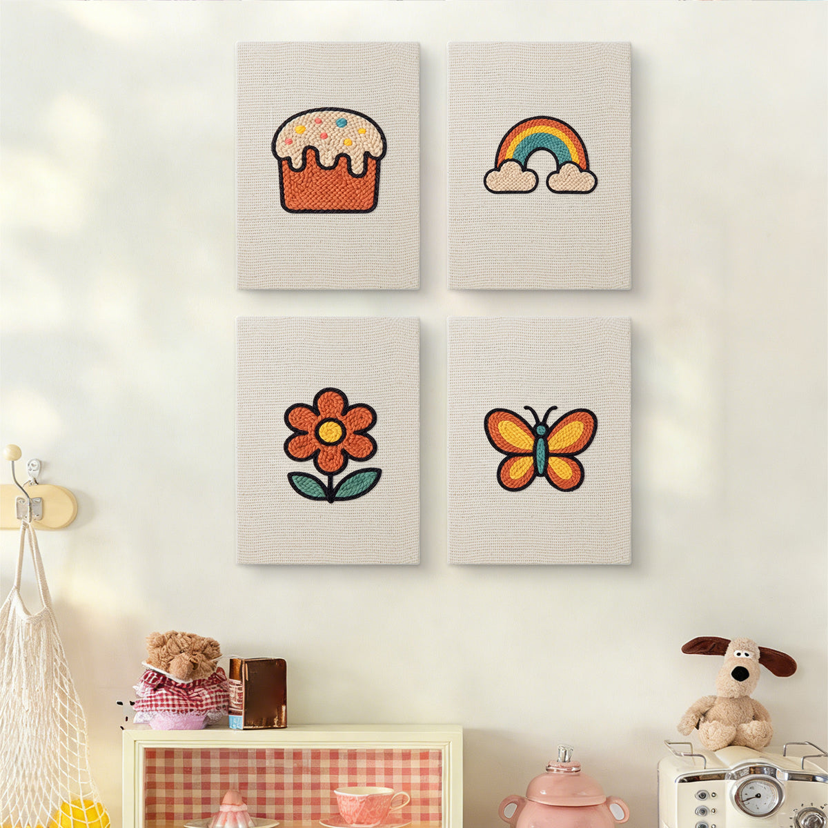 The four Rainbow and Butterfly mini canvases on a wall above a shelf