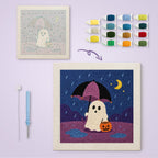 Rainy Night Ghost canvas before and after punching, with the threads and tools
