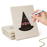 Hand punching one of the Reaper and Bat mini canvases