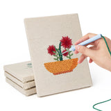 Hand punching one of the Red Bloom Bowls mini canvases