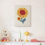 Finished Red Center Sunflower punch needle canvas on a wall
