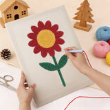 Punching the Red Daisy design with the punch needle