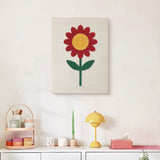 Finished Red Daisy punch needle canvas on a wall