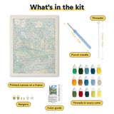 What is in the Red Lake Cabin kit: printed canvas, punch needle, threader, threads, color guide and hangers