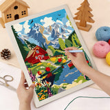 Punching the Red Lake Cabin design with the punch needle