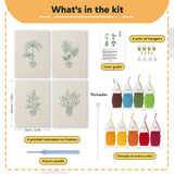 What is in the Red Pot Palms set: 4 printed canvases, punch needle, threader, threads, color guide and 4 sets of hangers (6 × 8 in (15 × 20 cm) each)