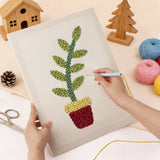 Punching the Red Pot Sprig design with the punch needle