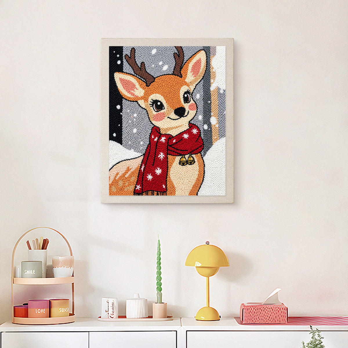 Finished Red Scarf Fawn punch needle canvas on a wall