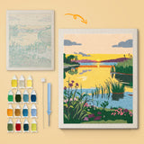 Reed Lake Sunset canvas before and after punching, with the threads and tools
