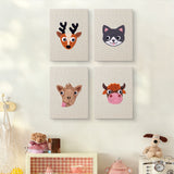 The four Reindeer and Cow mini canvases on a wall above a shelf