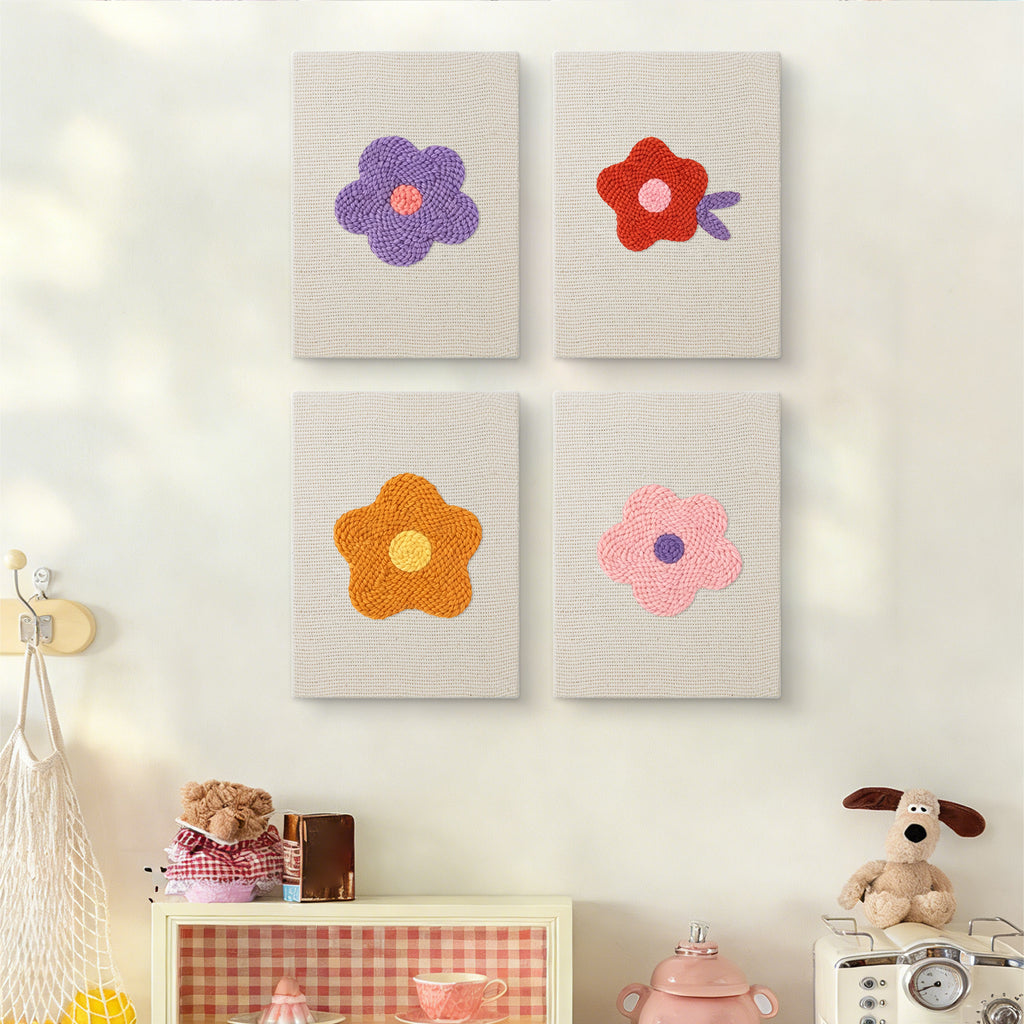The four Retro Flower Heads mini canvases on a wall above a shelf