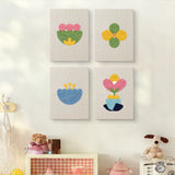 The four Retro Flower Shapes mini canvases on a wall above a shelf