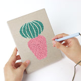 Punching a Retro Table Lamps mini canvas with the punch needle
