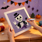 Punching the Rock Star Skeleton design with the punch needle