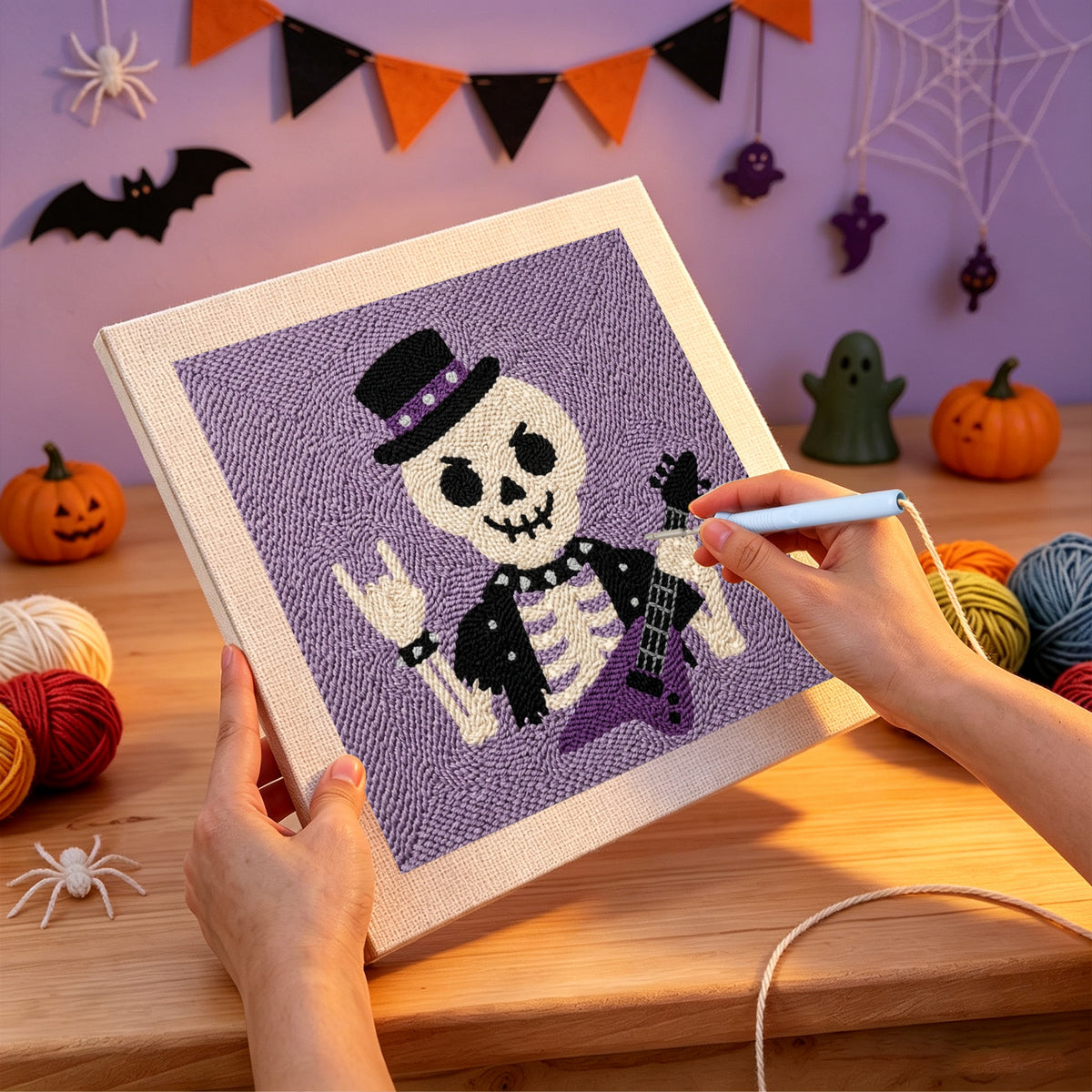 Punching the Rock Star Skeleton design with the punch needle