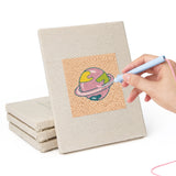 Hand punching one of the Rocket and Saucer mini canvases