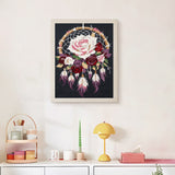 Finished Rose Dreamcatcher punch needle canvas on a wall
